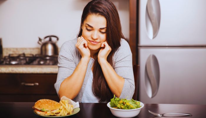 girl looking at the food